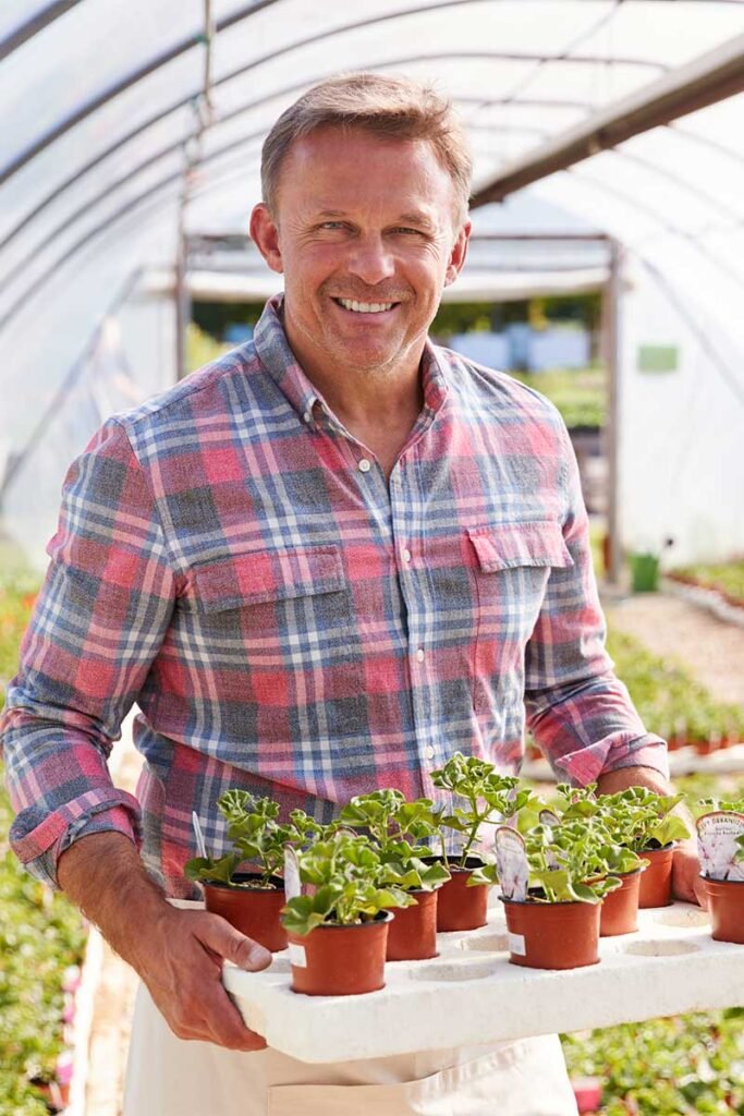 Portrait Of Mature Man Working In Garden Center Gr Pb4quu9.jpg