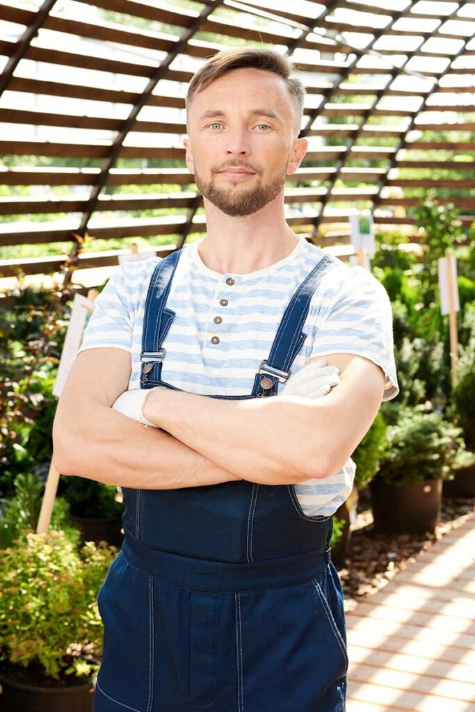 Worker Posing In Garden 2b6e4jw.jpg